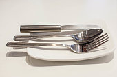 silverware on a white plate