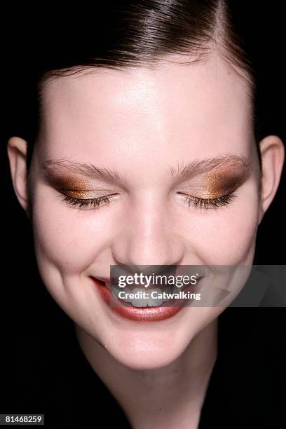 Model backstage at the Daks Fall/Winter 2008/2009 collection during Milan Fashion Week on February 19, 2008 in Milan, Italy.