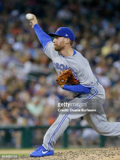 Danny Barnes of the Toronto Blue Jays pitches against the Detroit Tigers during the seventh inning at Comerica Park on July 14, 2017 in Detroit,...