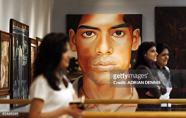 Painting entitled "Systematic Citizen 9 to 9" by artist Riyas Komu is pictured at Christie's auction house, in London, on June 6, 2008. Christie's...