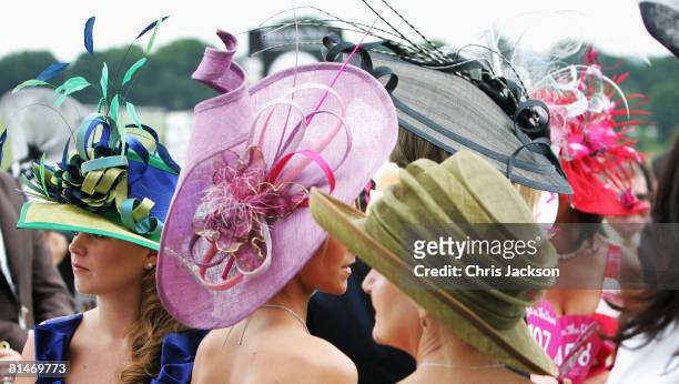 Women in hats are seen during Ladies Day at The Derby Festival on June 6, 2008 in Epsom, England.