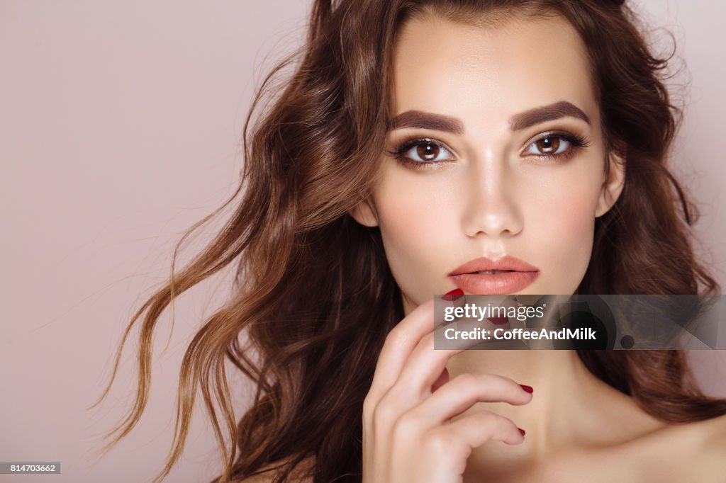 Studio shot of young beautiful woman