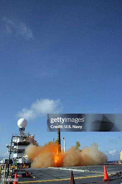 Short-range, unitary, ballistic missile, Scud-like target lifts off from the decommissioned USS Tripoli in a Missile Defense Agency flight test June...