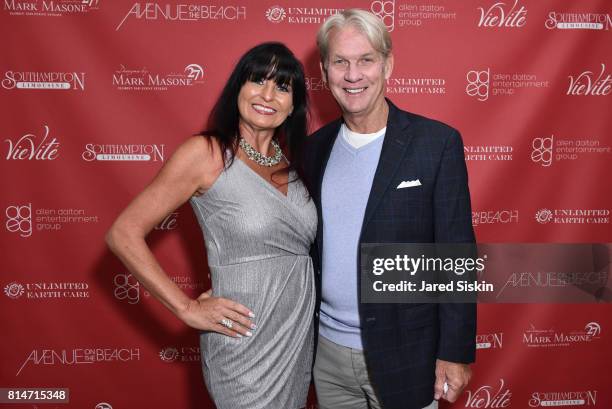 Boo Menestrina and John Flaherty attend AVENUE on the Beach Celebrates its Hamptons Editors, Toby and Larry Milstein on July 14, 2017 in Sagaponack,...