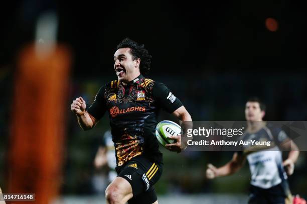 James Lowe of the Chiefs makes a break during the round 17 Super Rugby match between the Chiefs and the Brumbies at Waikato Stadium on July 15, 2017...