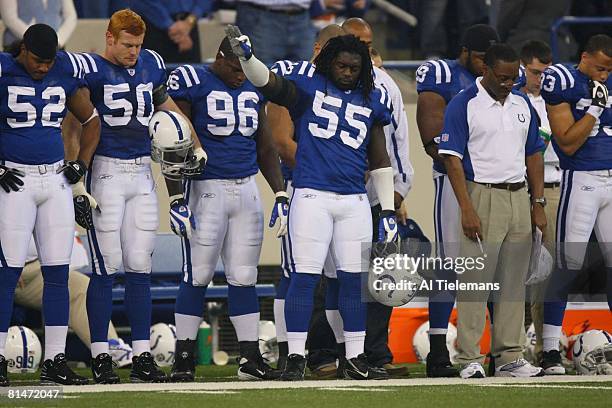 Football: Indianapolis Colts Clint Session with teammates Ramon Guzman , Rocky Boiman , and Keyunta Dawson during moment of silence commemorating...