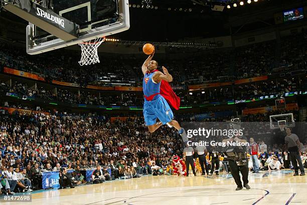 Basketball: NBA Slam Dunk Contest, Orlando Magic Dwight Howard in action, making dunk and wearing Superman cape during All Star Weekend, New Orleans,...