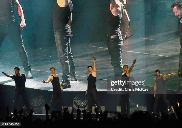 Jonathan Knight, Joey McIntyre, Donnie Wahlberg, Jordan Knight, and Danny Wood of New Kids On The Block perform during The Total Package Tour at...