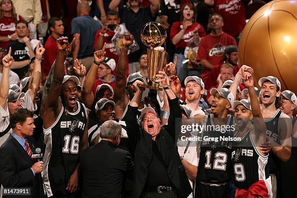 Basketball: NBA Finals, San Antonio Spurs owner Peter Holt victorious with Larry O'Brien trophy, Francisco Elson , Bruce Bowen , Tony Parker , and...