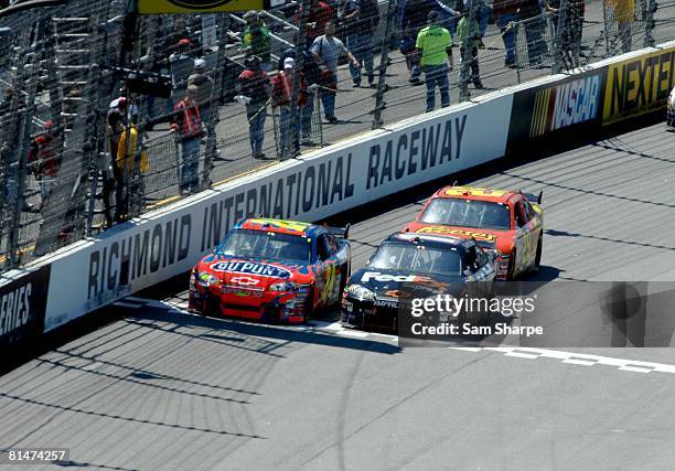 Auto Racing: NASCAR Crown Royal Jim Stewart 400, Denny Hamlin in action vs Jeff Gordon and Kevin Harvick during race at Richmond International...