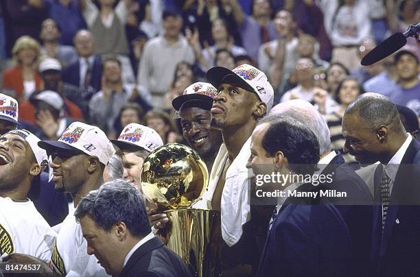 Basketball: NBA Finals, Chicago Bulls Michael Jordan and Dennis Rodman victorious with NBA Championship trophy after winning Game 6 vs Seattle...