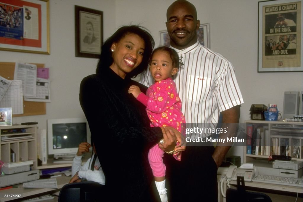 Casual portrait of Evander Holyfield with wife Dr, Janice Itson and