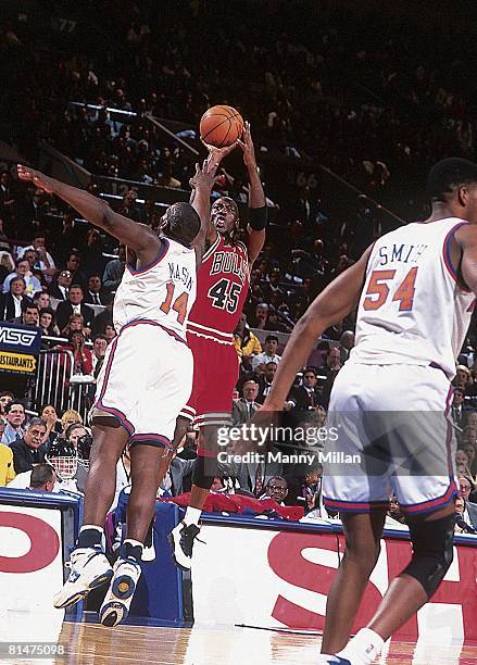 Basketball: Chicago Bulls Michael Jordan in action, taking shot vs New York Knicks Anthony Mason , New York, NY 3/28/1995