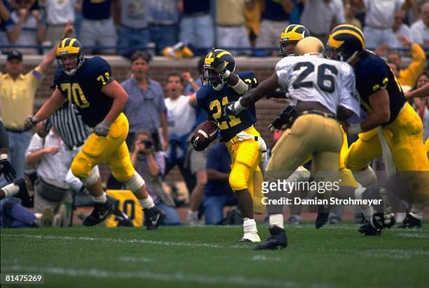 College Football: Michigan Desmond Howard in action, scoring touchdown during 4th down play vs Notre Dame, Ann Arbor, MI 9/14/1991