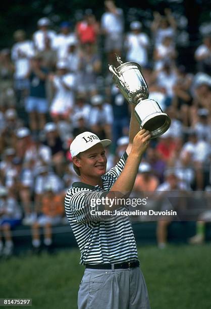 Golf: US Open, Ernie Els victorious with trophy after winning three way playoff and tournament on Monday at Oakmont CC, Oakmont, PA 6/20/1994