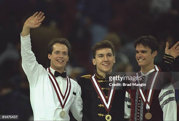 Figure Skating: CAN Championships, Closeup of Kurt Browning , and Elvis Stojko victorious with medals on stand, Edmonton, CAN 1/15/1994