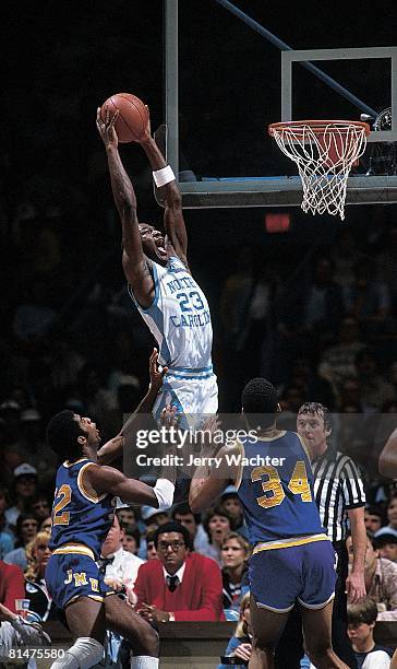 College Basketball: NCAA playoffs, North Carolina Michael Jordan in action, making dunk vs James Madison, Greensboro, NC 3/19/1983