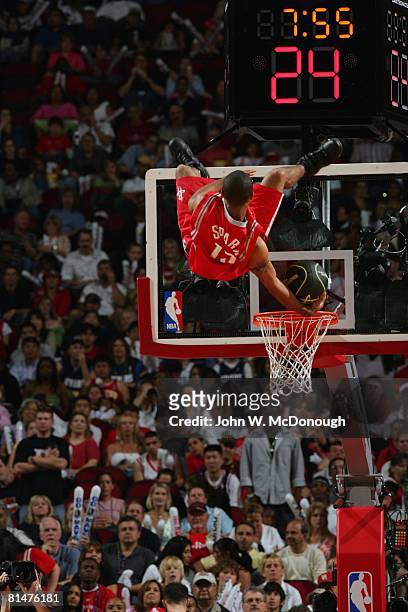 Basketball: NBA playoffs, Houston Rockets halftime performer in action, making dunk during game vs Dallas Mavericks, Houston, TX 4/30/2005