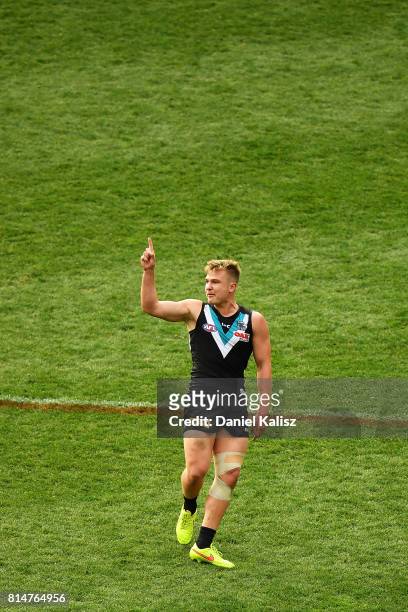 Ollie Wines of the Power celebrates after kicking a goal during the round 17 AFL match between the Port Adelaide Power and the North Melbourne...