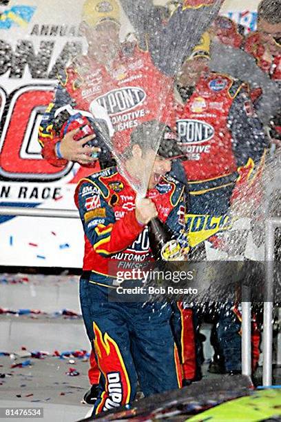 Auto Racing: NASCAR Daytona 500, Jeff Gordon victorious with champagne after winning race, Daytona, FL 2/19/2005