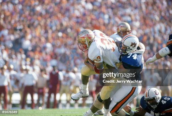 Auburn Tracy Rocker in action, making tackle vs Florida State,... News ...