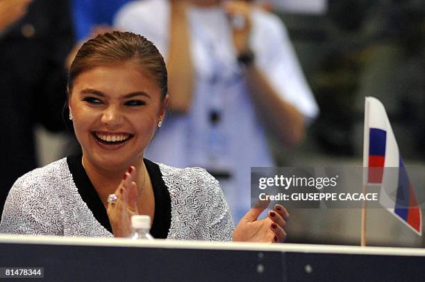 Russian former gymnast Alina Kabaeva attends the senior event at European Championships in Rhythmic Gymnastics in Turin on June 6, 2008. AFP PHOTO /...