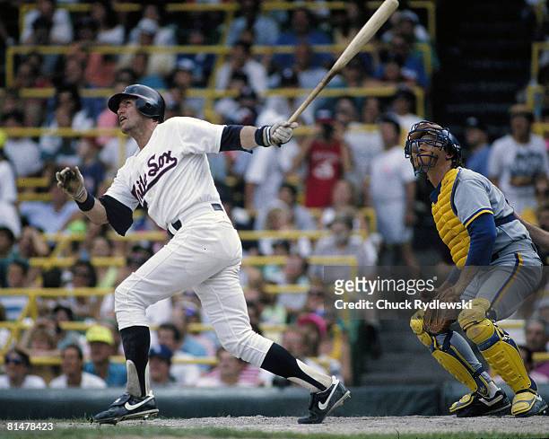 Chicago White Sox catcher, Carlton Fisk, batting during a game against the Milwaukee Brewers at Old Comiskey Park in Chicago, Illinois August, 1987....