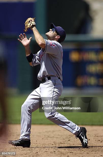 Second baseman Jamey Carroll of the Cleveland Indians fields his position as he catches an infield fly ball during the game against the Kansas City...