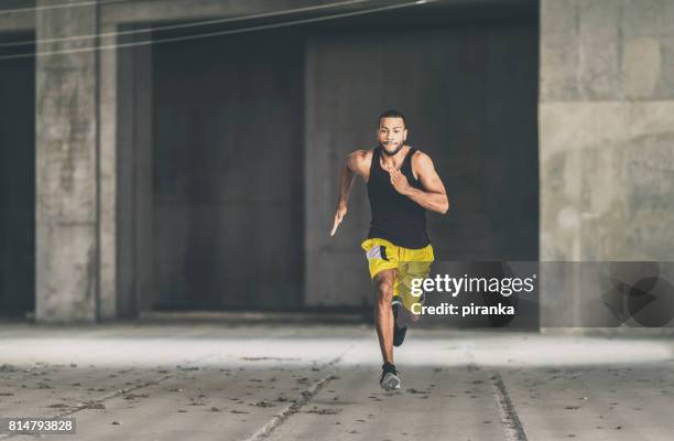 Sprintf Man 1,251 Man Sprinting Front View Stock Photos, High-Res Pictures, and ...