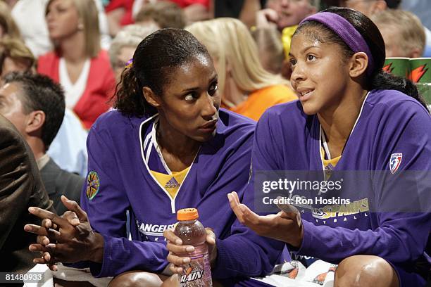 Lisa Leslie and Candace Parker of the Los Angeles Sparks talk on the bench during the game against the Indiana Fever at Conseco Fieldhouse on May 29,...