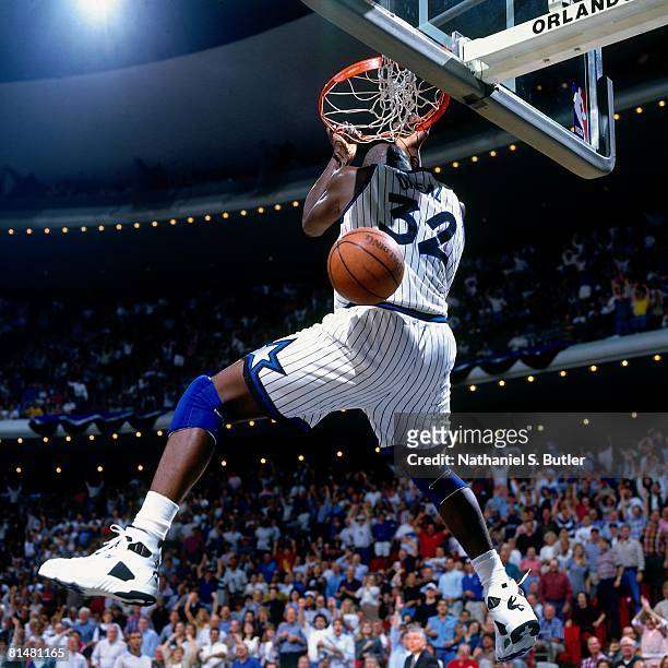 Shaquille O'Neal of the Orlando Magic dunks against the Indiana Pacers in Game One of the Eastern Conference Quarterfinals during the 1994 NBA...