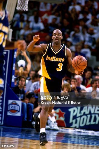 Haywoode Workman of the Indiana Pacers moves the ball up court against the Orlando Magic in Game One of the Eastern Conference Quarterfinals during...