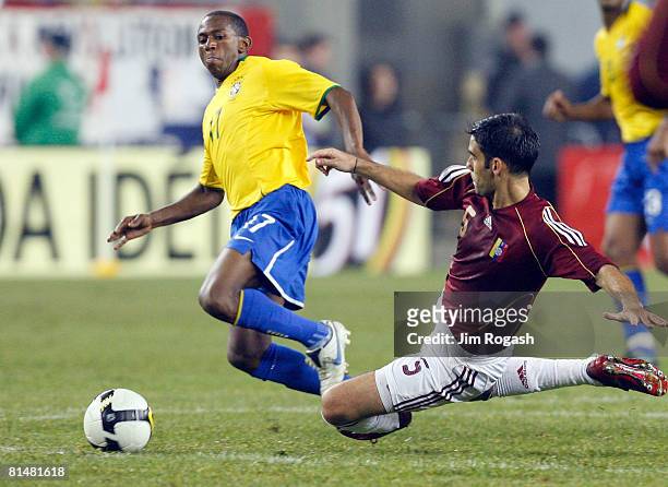 Micky Mea Vitali of Venezuela battles Mineiro of Brazil during a friendly exhibition soccer match at Gillette Stadium on June 6 in Foxboro,...