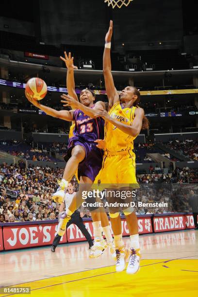 Cappie Pondexter of the Phoenix Mercury goes to the basket against Lisa Leslie of the Los Angeles Sparks on June 6, 2008 at Staples Center in Los...