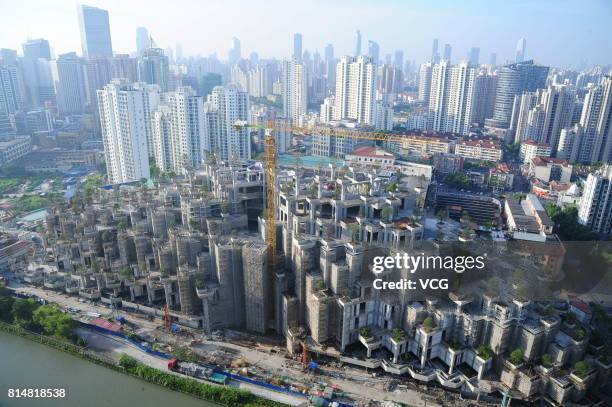 Aerial view of the building dubbed as the Hanging Gardens of Babylon under construction on July 15, 2017 in Shanghai, China. The building will be...