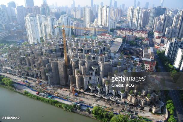 Aerial view of the building dubbed as the Hanging Gardens of Babylon under construction on July 15, 2017 in Shanghai, China. The building will be...