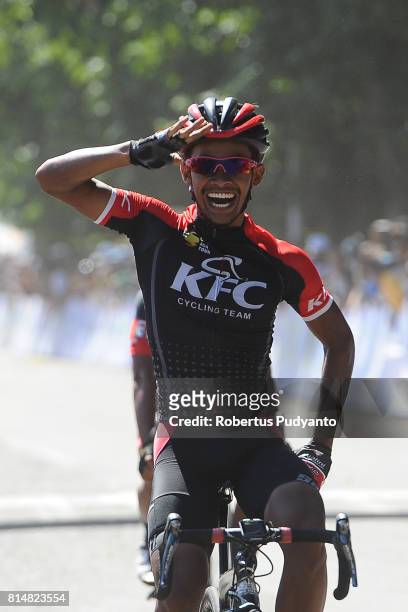 Muh. Imam Arifin of KFC Cycling Team Indonesia celebrates after winning Stage 2 of Tour de Flores 2017, Maumere-Ende 142.8 km on July 15, 2017 in...