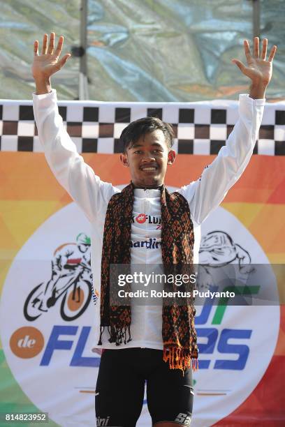 White jersey winner Muh. Imam Arifin of KFC Cycling Team Indonesia celebrates on the podium during Stage 2 of Tour de Flores 2017, Maumere-Ende 142.8...