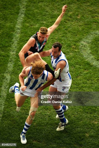 Jackson Trengove of the Power attempts to kick the ball during the round 17 AFL match between the Port Adelaide Power and the North Melbourne...