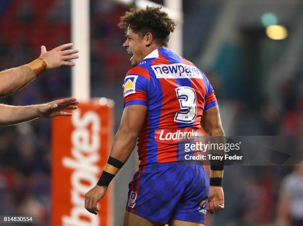 Dane Gagai of the Knights celebrates a try during the round 19 NRL match between the Newcastle Knights and the Brisbane Broncos at McDonald Jones...