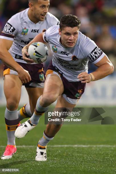 James Roberts of the Broncos runs the ball during the round 19 NRL match between the Newcastle Knights and the Brisbane Broncos at McDonald Jones...