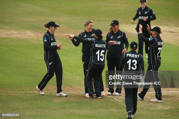 Lea Tahuhu of New Zealand celebrates with Katey Martin of New Zealand after taking the wicket of Punham Raut of India during the ICC Women's World...