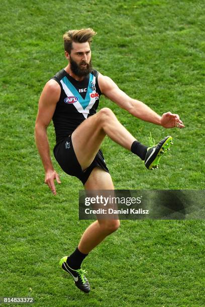 Justin Westhoff of the Power kicks the ball during the round 17 AFL match between the Port Adelaide Power and the North Melbourne Kangaroos at...