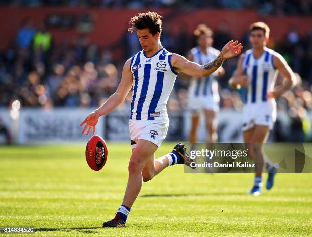 Jy Simpkin of the Kangaroos kicks the ball during the round 17 AFL match between the Port Adelaide Power and the North Melbourne Kangaroos at...