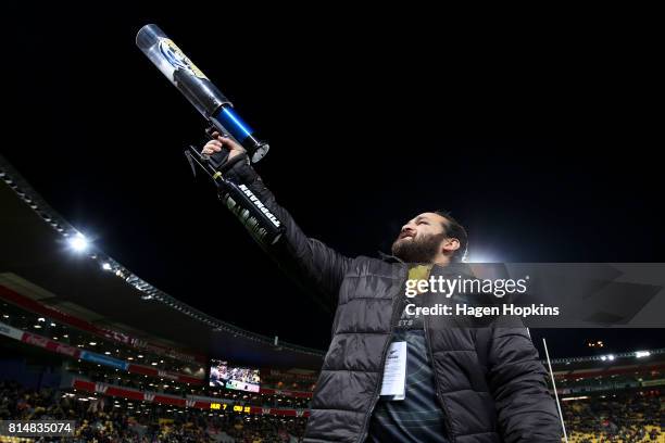 Former Hurricanes player Piri Weepu fires a t-shirt cannon during the round 17 Super Rugby match between the Hurricanes and the Crusaders at Westpac...