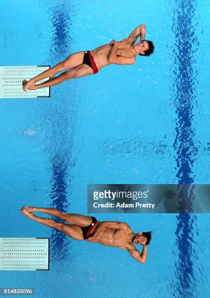 Philippe Gagne of Canada and Francois Imbeau-Dulac of Canada competes during the Men's Diving 3m Sychro Springboard, Preliminary Round on day two of...