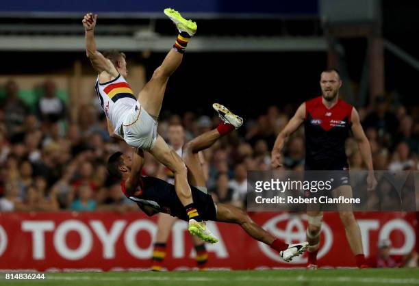Hugh Greenwood of the Crows and Neville Jetta of the Demons collide during the round 17 AFL match between the Melbourne Demons and the Adelaide Crows...