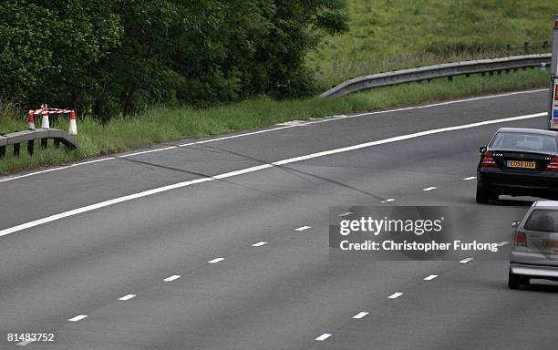 Skid marks and warning tape mark the spot on the M6 southbound motorway near Keele services where two boys aged eight and 10 were killed in a car...