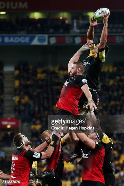 Sam Lousi of the Hurricanes wins a lineout over Luke Romano of the Crusaders during the round 17 Super Rugby match between the Hurricanes and the...