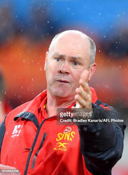 Coach Rodney Eade talks to his players at the 3rd quarter break during the round 17 AFL match between the Gold Coast Suns and the Collingwood Magpies...